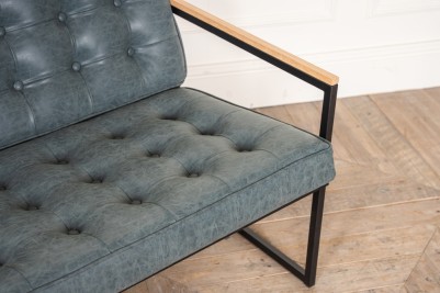worn denim upholstered sofa
